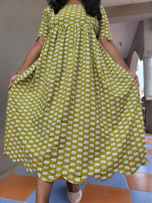 Cutwork yellow elephant print feeding kurtis