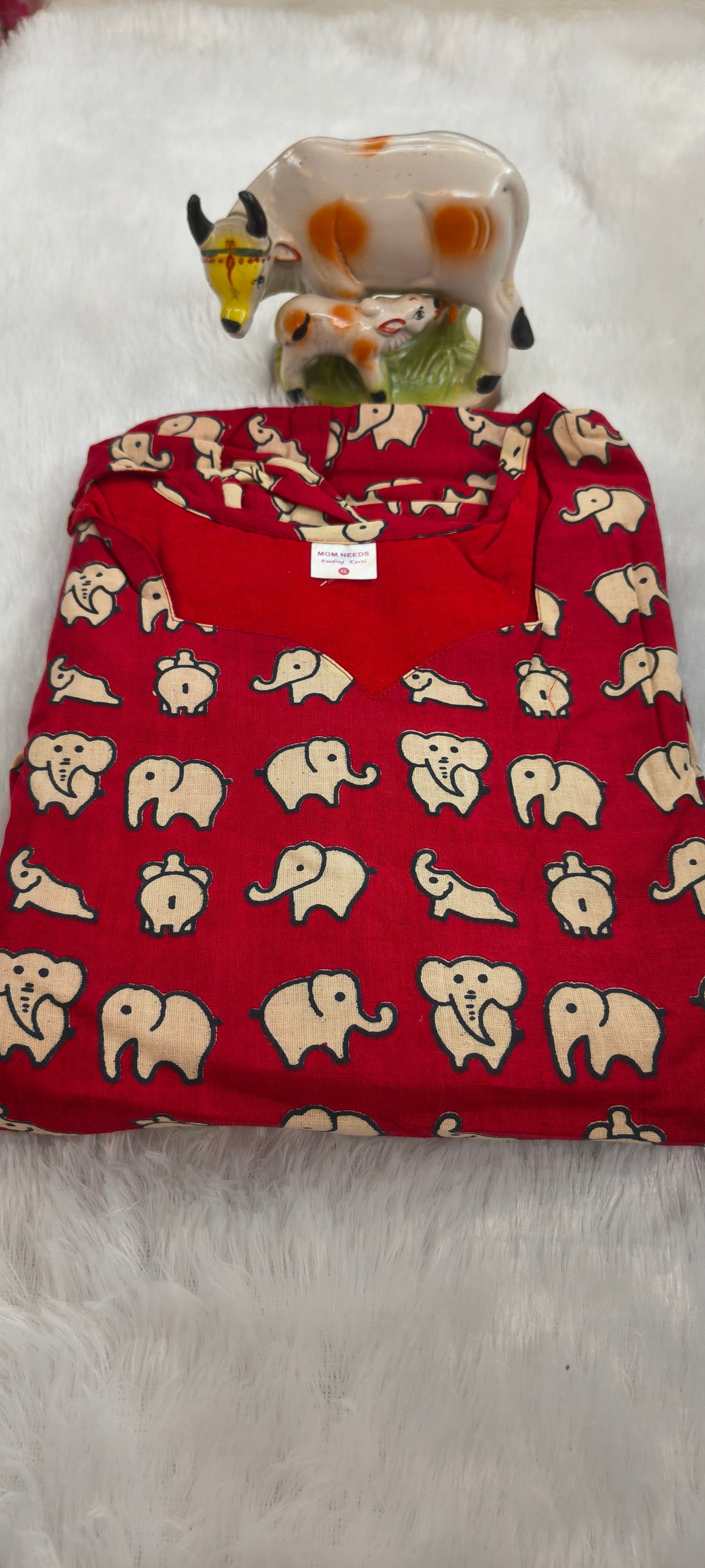 Feeding elephant red clr