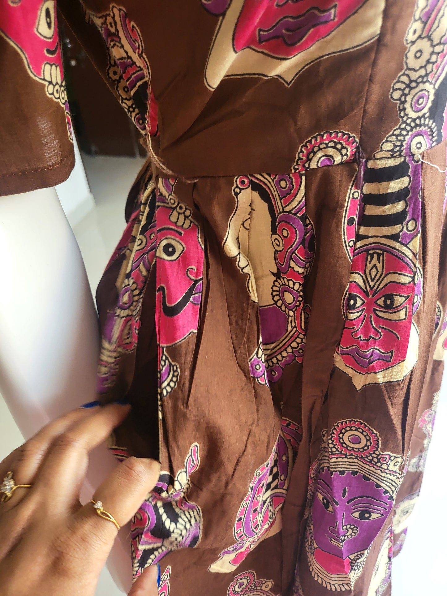 Kalamkaari faces brown