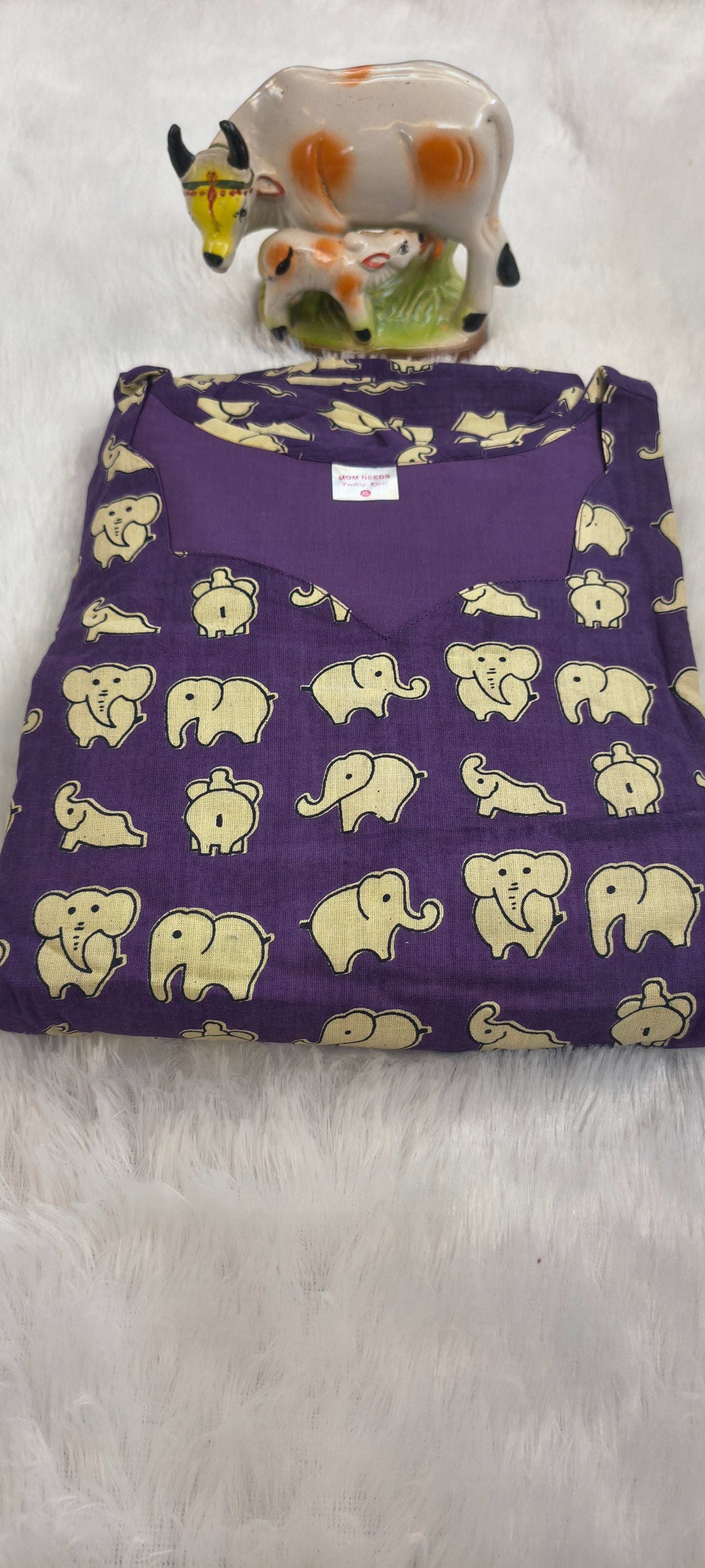 Feeding elephant purple